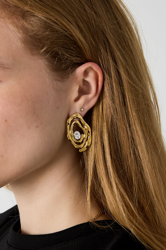 Getwiste oorbellen met strass steen