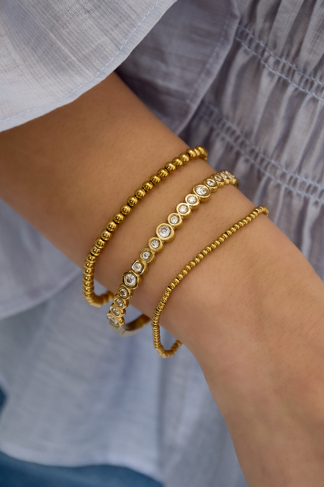 Bangle armband met ronde steentjes